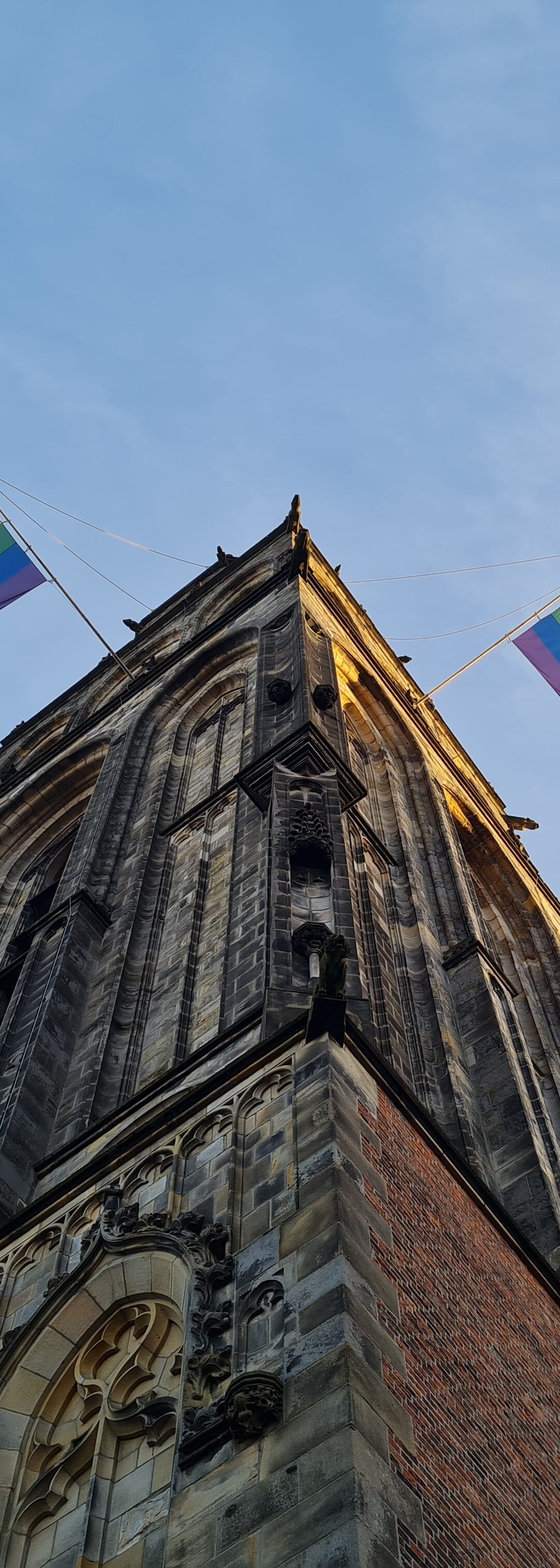 Pride Groningen 2023 programmatips met foto regenboogvlag Martinitoren